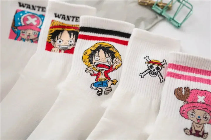 Childhood Mugiwara Luffy cartoon character socks with wanted poster embroidery, white socks folded neatly in box on denim fabric